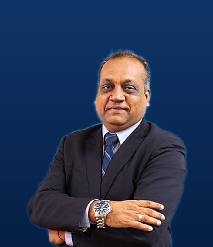 Formal studio portrait of Mr Sham Mathura, FCCA